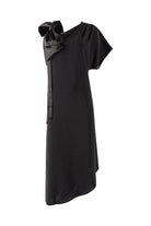 Black one-shoulder dress with a bow detail on a white background
