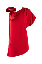 Red one-shoulder top with a bow detail on a white background