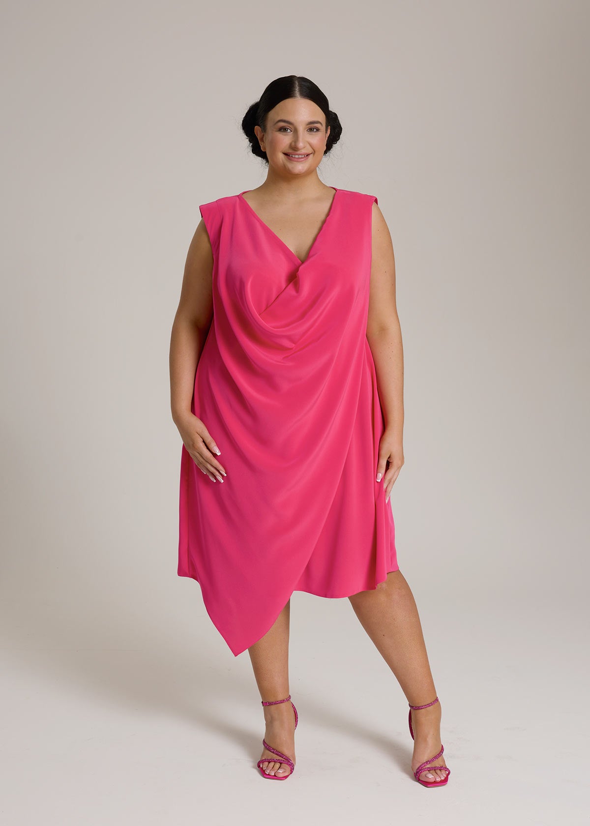 Monessa Joan pink Ailbhe Dress with asymmetrical hemline.