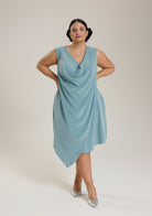 Monessa Joan sleeveless teal Ailbhe dress with silver shoes