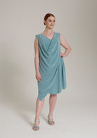 Monessa Joan sleeveless Ailbhe dress with draped neckline and asymmetrical hemline.