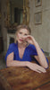 video of a woman wearing a royal blue outfit
