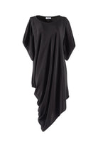Black draped dress on a white background