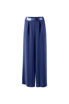 Navy blue wide trousers with a shiny waistband on a white background
