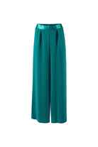 Teal wide teal trousers on a white background